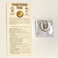 Front of information card and both modified coins