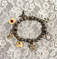 Front of bracelet showing all medical charms