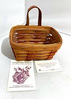 Basket with brochure and quality card displayed