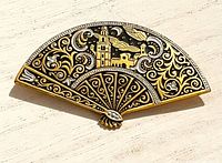 Front view of Damascene fan brooch showing design details