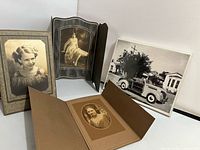 Front view showing all four mounted photographs