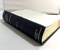 Album closed showing spine text International Postage Stamp Album Part IV