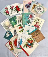 Top view assortment of vintage greeting cards spread out