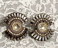 Front view of fan-shaped rhinestone earrings