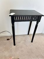 Full view of black accent table