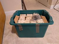 Tote with multiple boxes of golf gloves