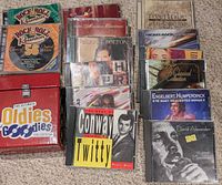 Full view of both CD stands and storage box