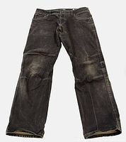 Full view of KUHL brown canvas pants front side