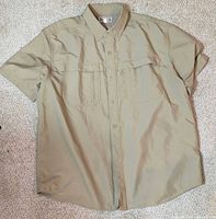 Full front view of khaki Duluth Trading short-sleeve button shirt