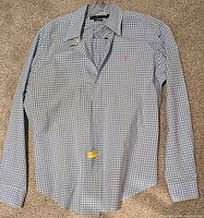 Full view of Ralph Lauren check shirt on hanger