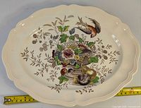Top view of entire oval platter showing scalloped rim and central Hampshire pattern