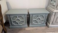 Front view of both matching mint green side cabinets