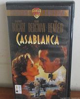 Front view of VHS case showing title, cast, artwork