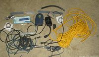 Full lot view showing extension cord, air pumps, timers, heater, tubing, air stones