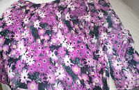 Overall view of floral fabric spread out