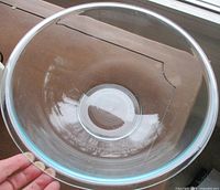 Top view of clear blue-tint Pyrex bowl showing interior and rim