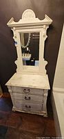 Front view of dresser/vanity showing mirror, drawers, handles and overall condition