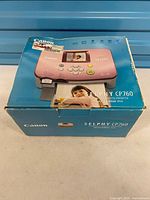 Retail box showing model and pink printer image