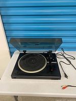 Full view of Kenwood KD-291R turntable with dust cover open showing platter, tonearm, cables