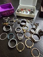 Full view of rings spread out with boxes