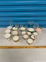 Group shot of all teacups and glassware