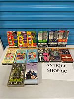 All fourteen VHS tapes displayed on table