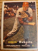 Front of 1957 Topps Robin Roberts card showing player image and name