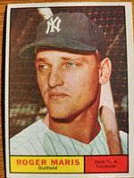 Front of 1961 Topps Roger Maris card showing portrait, team logo, nameplate