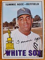 Front of 1967 Topps Tommie Agee card showing player image, name, position, team and trophy graphic