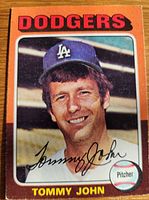 Front of 1975 Topps Tommy John card showing portrait, Dodgers header, facsimile signature