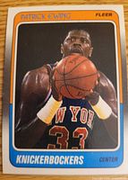 Front of 1988 Fleer Patrick Ewing card showing player image and team details