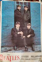 Full view of Beatles poster showing image, text and printed signatures