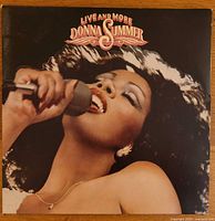 Front cover with Donna Summer microphone portrait and album title