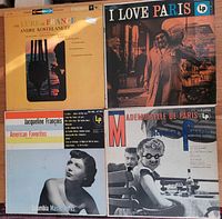 Front covers of the four LP records
