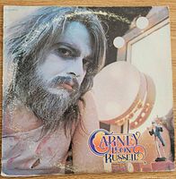 Front cover of Leon Russell Carney LP with portrait artwork