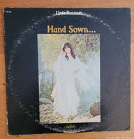 Front cover of Linda Ronstadt "Hand Sown..." LP showing title and Capitol logo