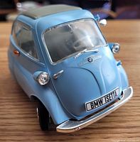 Front three-quarter view of light blue BMW Isetta model