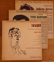 Three LP jackets stacked showing series and artists