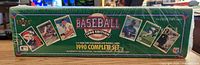 Front view of sealed Upper Deck 1990 Complete Set box showing branding and sample cards