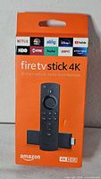 Front of retail box showing Fire TV Stick 4K image and branding