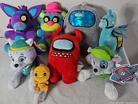 Group shot of all eight plush toys