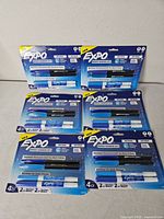 Six sealed Expo Mixed Marker Sets displayed
