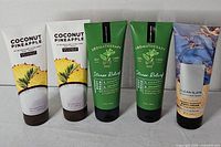 Front view of all five Bath & Body Works body cream tubes