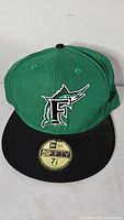 Front view showing Florida Marlins logo and 59FIFTY sticker