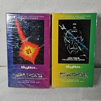Front view of both sealed SkyBox card set boxes