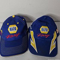 Both NAPA Racing caps front view
