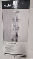 Front of box showing Style Selections tension pole shower caddy image and branding