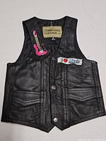 Front of black leather vest with patches