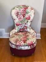 Front view of floral chintz slipper chair