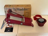 Mandoline slicer, pusher, leaflet and box